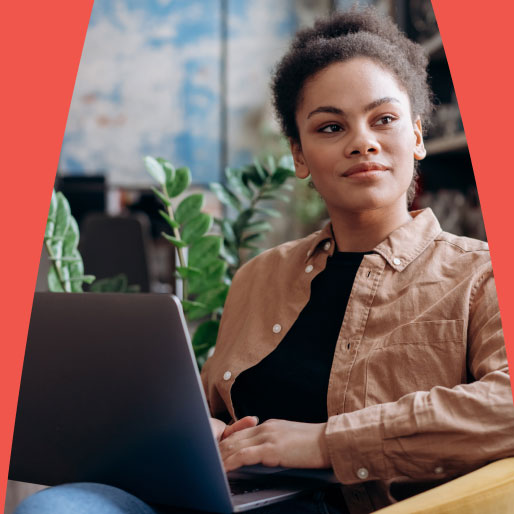 Confident woman looking away of computer screen